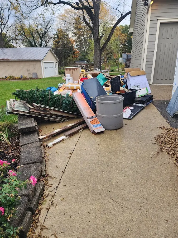 Dumpster being loaded with debris for Demolition Dumpster Rental in Pen Argyl